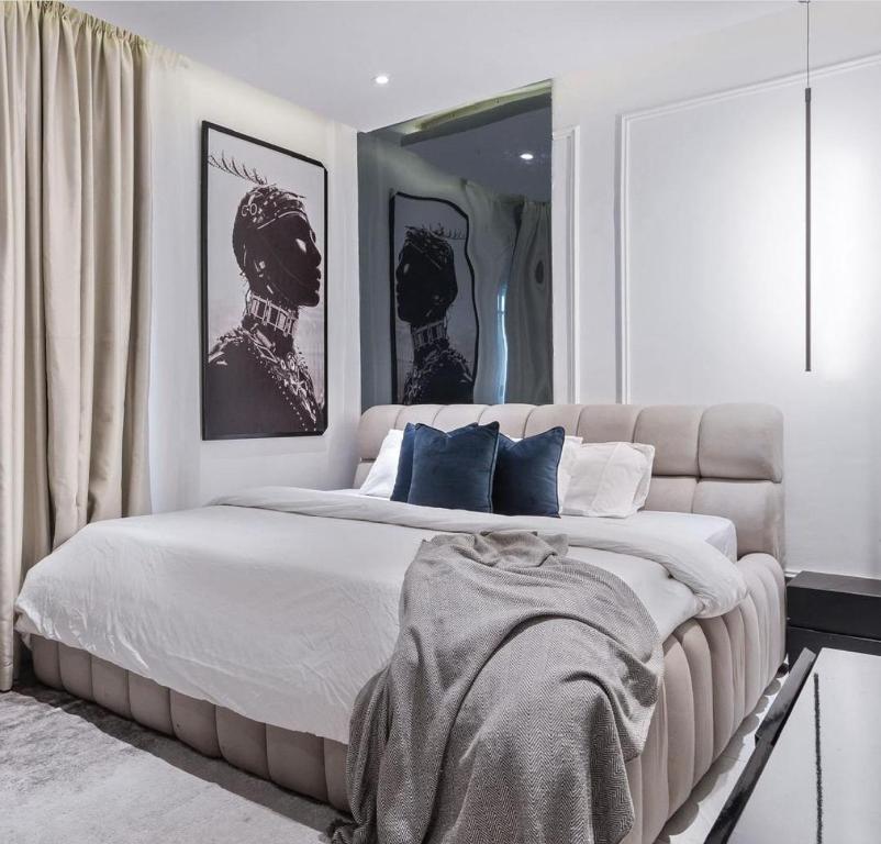 Postel nebo postele na pokoji v ubytování JJ Apartment