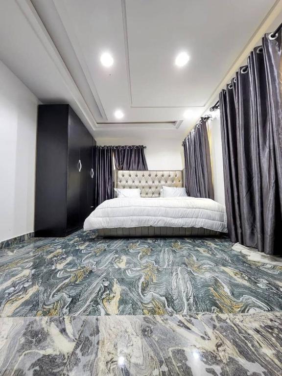 Postel nebo postele na pokoji v ubytování JJ Apartment