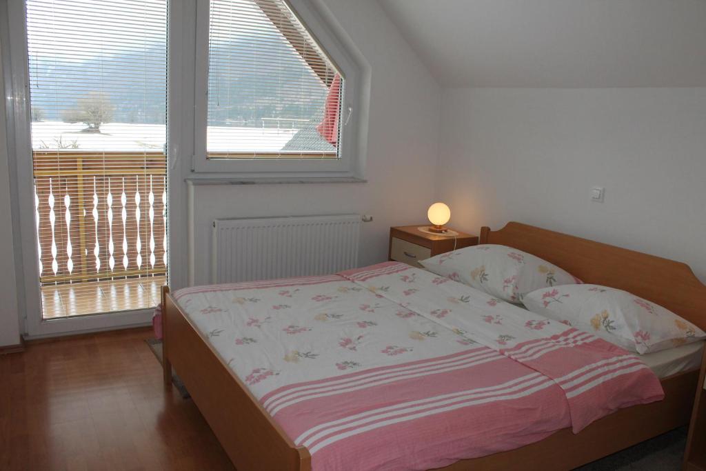מיטה או מיטות בחדר ב-Apartments Kovačič