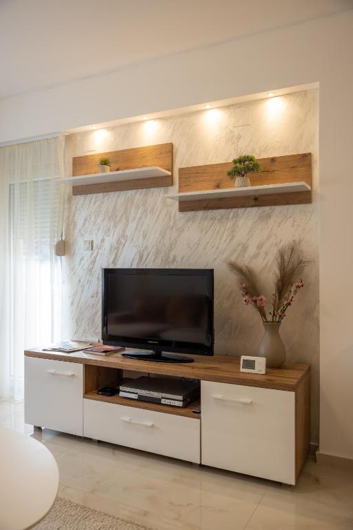 TV a/nebo společenská místnost v ubytování Relax