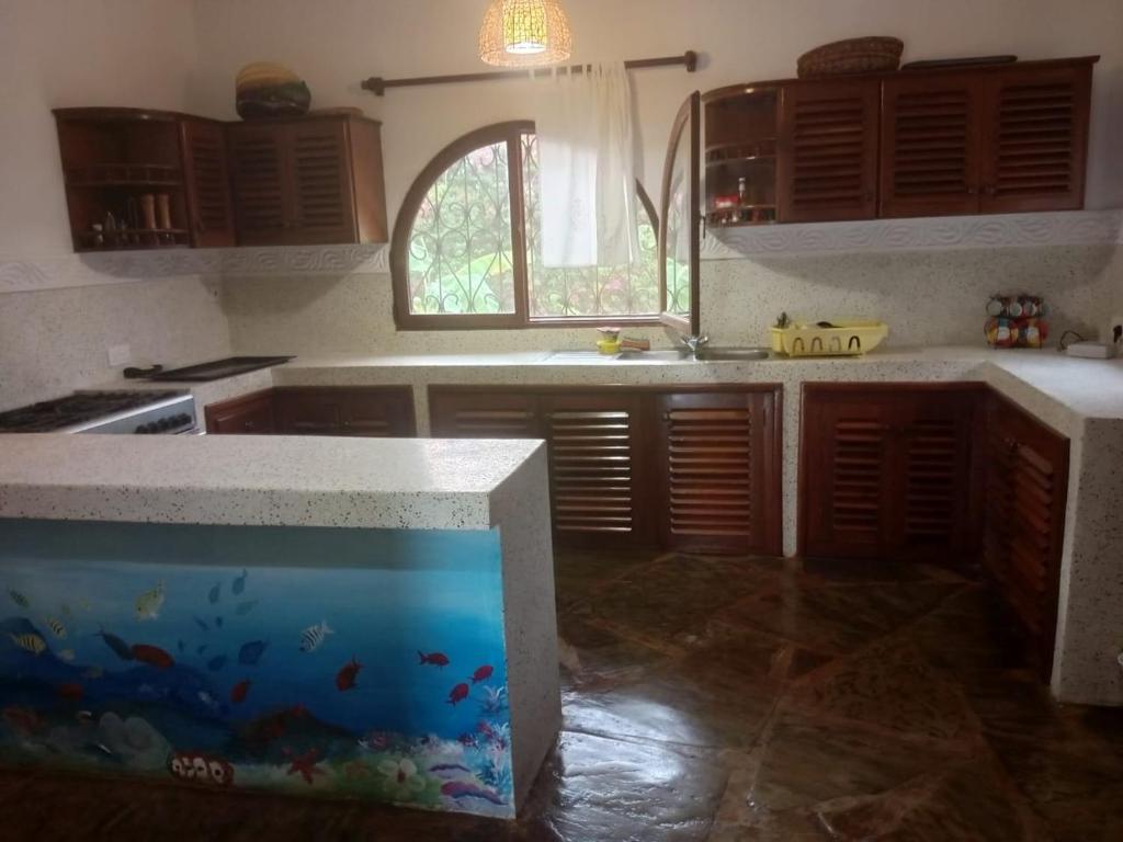 Kuchyň nebo kuchyňský kout v ubytování Villa Eden