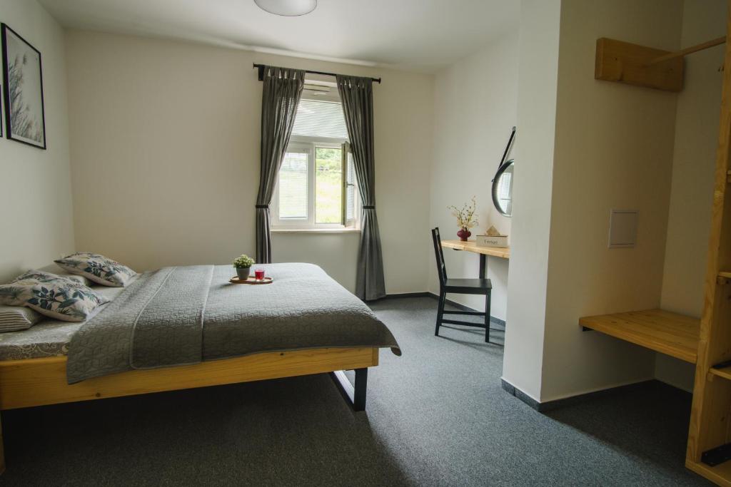 Posteľ alebo postele v izbe v ubytovaní Treehouse Apartments