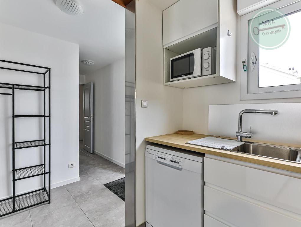 Kuchyňa alebo kuchynka v ubytovaní Maison Ker Mona