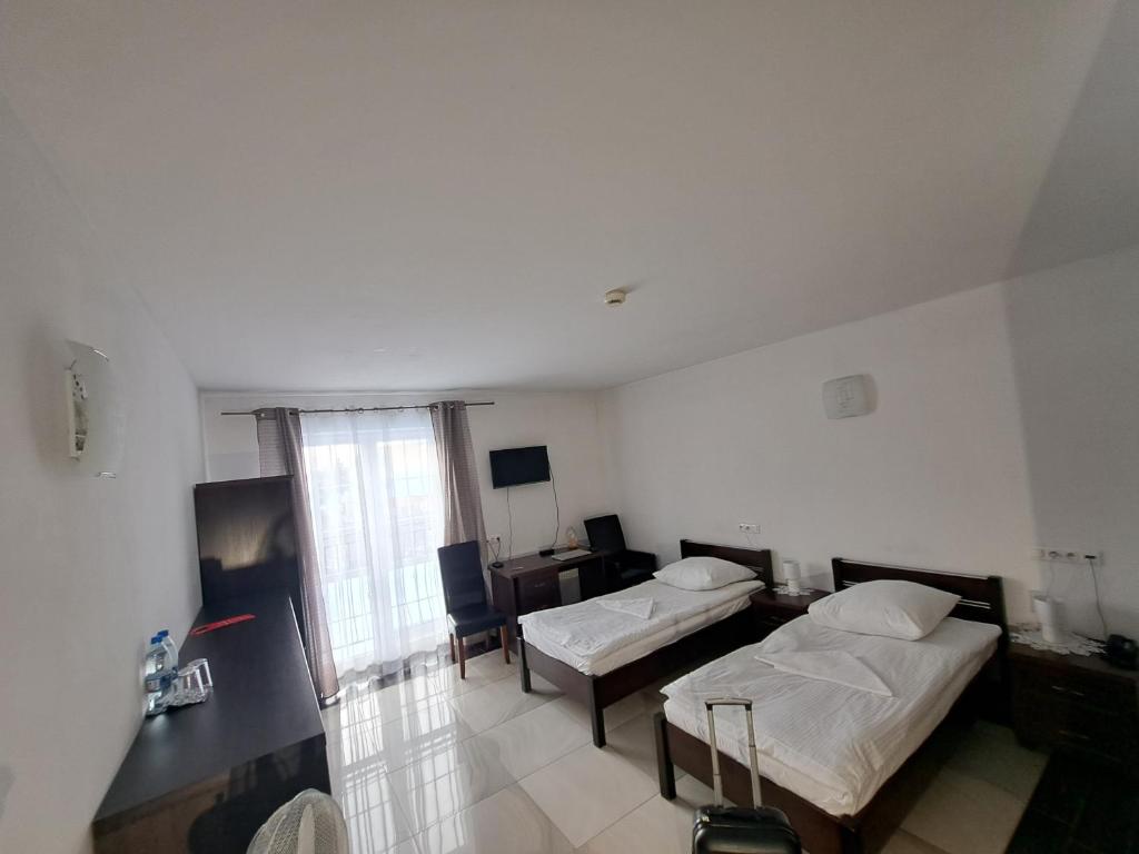 Łóżko lub łóżka w pokoju w obiekcie Hotel Agat & SPA