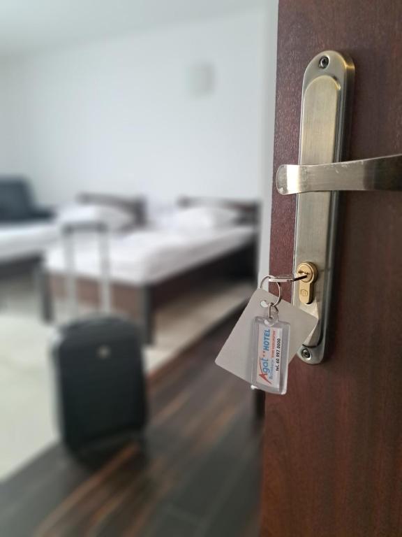 Łóżko lub łóżka w pokoju w obiekcie Hotel Agat & SPA