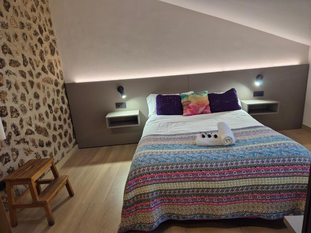 Posteľ alebo postele v izbe v ubytovaní Hostal Bavieca