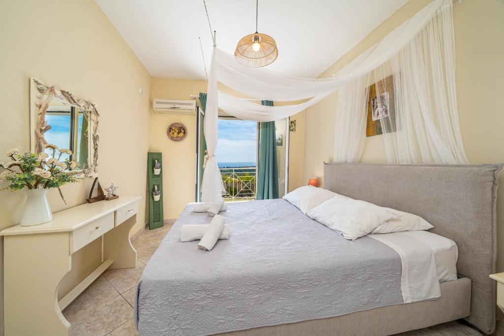 Postel nebo postele na pokoji v ubytování Fiora Villas