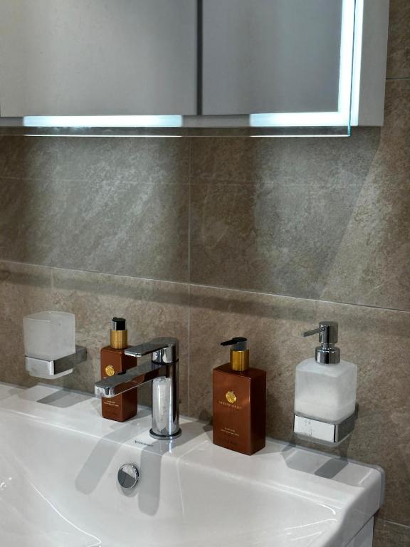 Koupelna v ubytování Modernes 3,5 Zimmer Apartment 100 m2 mit Alpenblick und 3 Terrassen