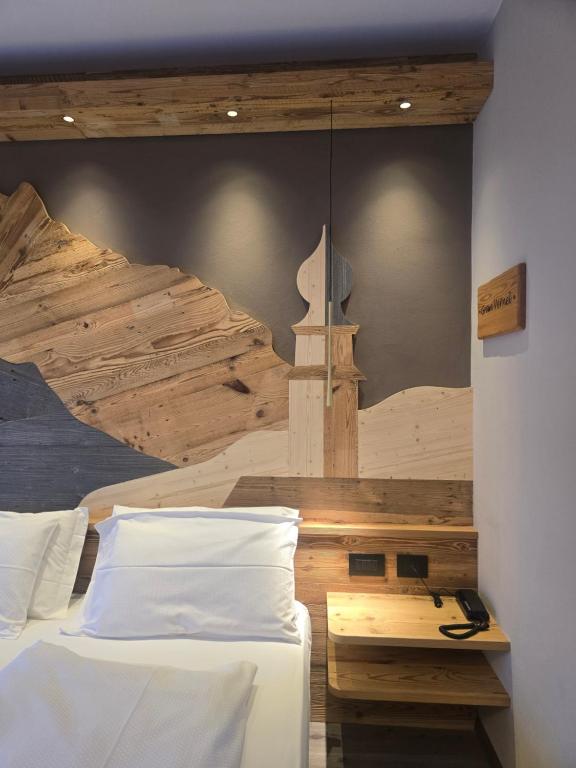Postel nebo postele na pokoji v ubytování Hotel Azola