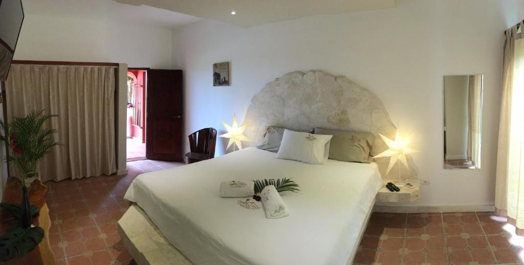 Postel nebo postele na pokoji v ubytování Cabrera Chalet boutique hotel