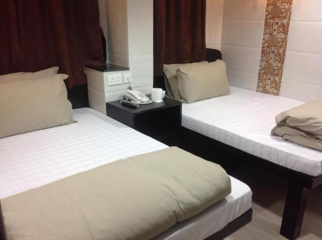Voodi või voodid majutusasutuse ILoilo Guest House toas