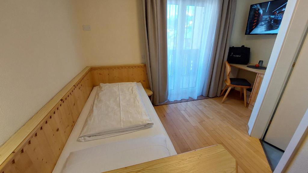 TV a/nebo společenská místnost v ubytování Hotel Cristallo