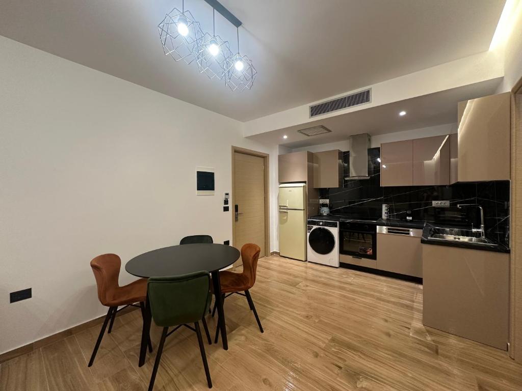 Kuchyň nebo kuchyňský kout v ubytování Suites Kozi