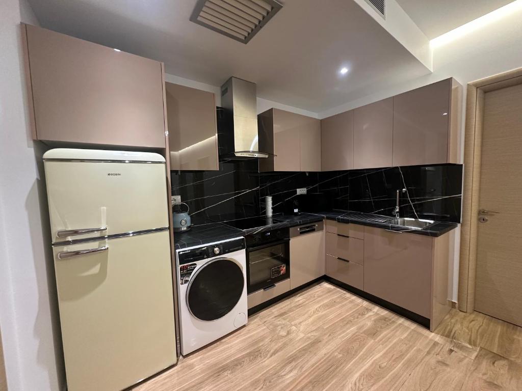 Kuchyň nebo kuchyňský kout v ubytování Suites Kozi