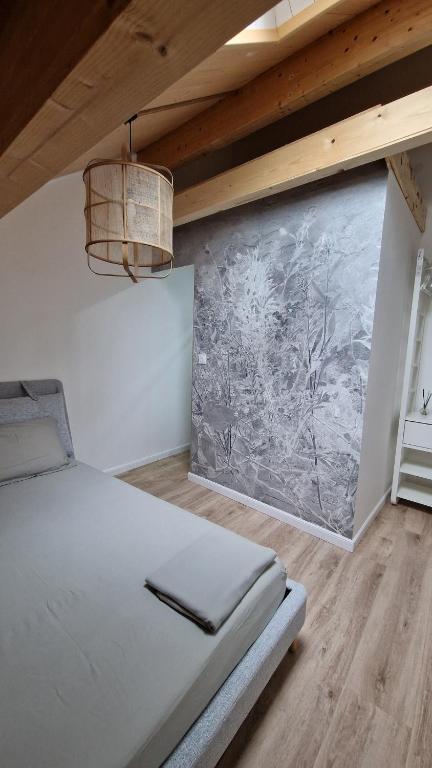 Postel nebo postele na pokoji v ubytování Duplex type chalet dans le Jura