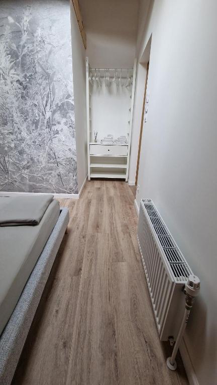 Postel nebo postele na pokoji v ubytování Duplex type chalet dans le Jura