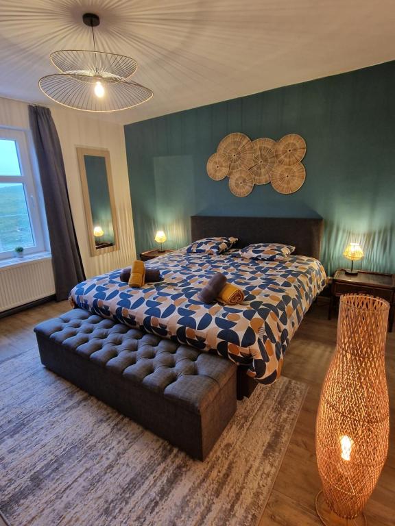 Postel nebo postele na pokoji v ubytování Gîte au cœur de la famenne