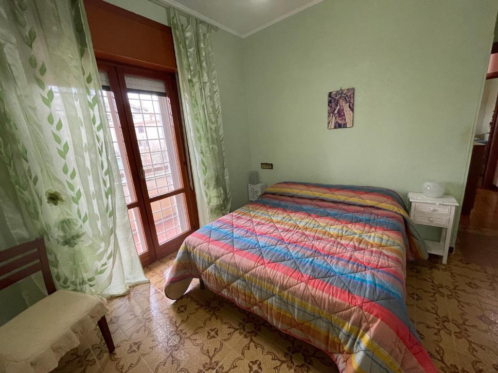 A bed or beds in a room at Via Capri 4