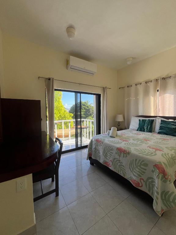 Postel nebo postele na pokoji v ubytování Hotel Caribe