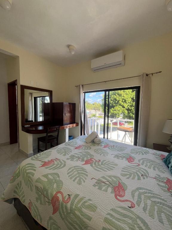 Postel nebo postele na pokoji v ubytování Hotel Caribe
