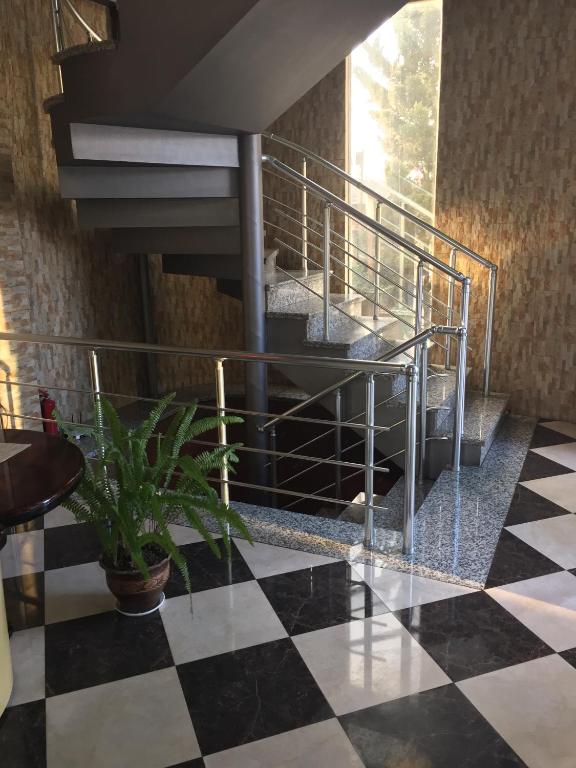 Postel nebo postele na pokoji v ubytování Hotel Piza