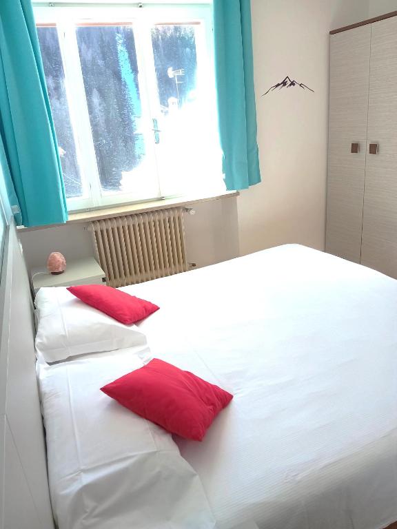 Postelja oz. postelje v sobi nastanitve Hotel B&B Lorenzini Ski
