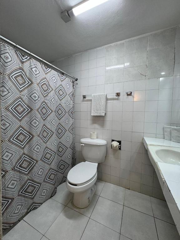 Koupelna v ubytování Hotel Caribe