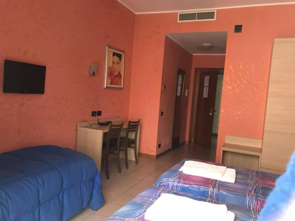 Postel nebo postele na pokoji v ubytování Hotel ristorante 2 Platani
