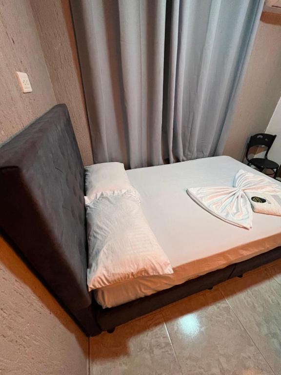 Postel nebo postele na pokoji v ubytování Hotel Almalu
