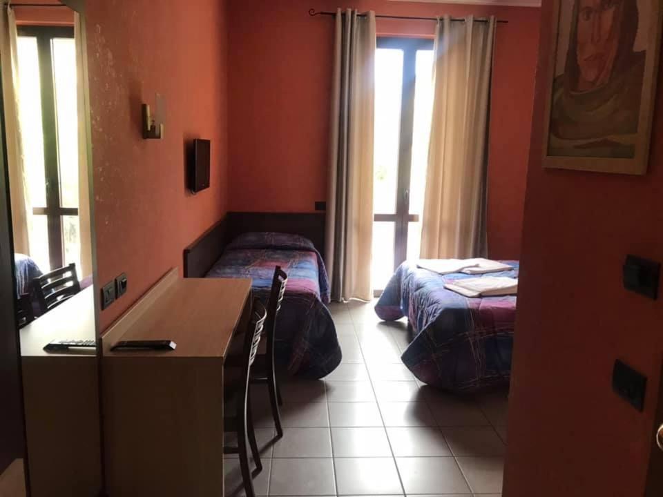 Postel nebo postele na pokoji v ubytování Hotel ristorante 2 Platani
