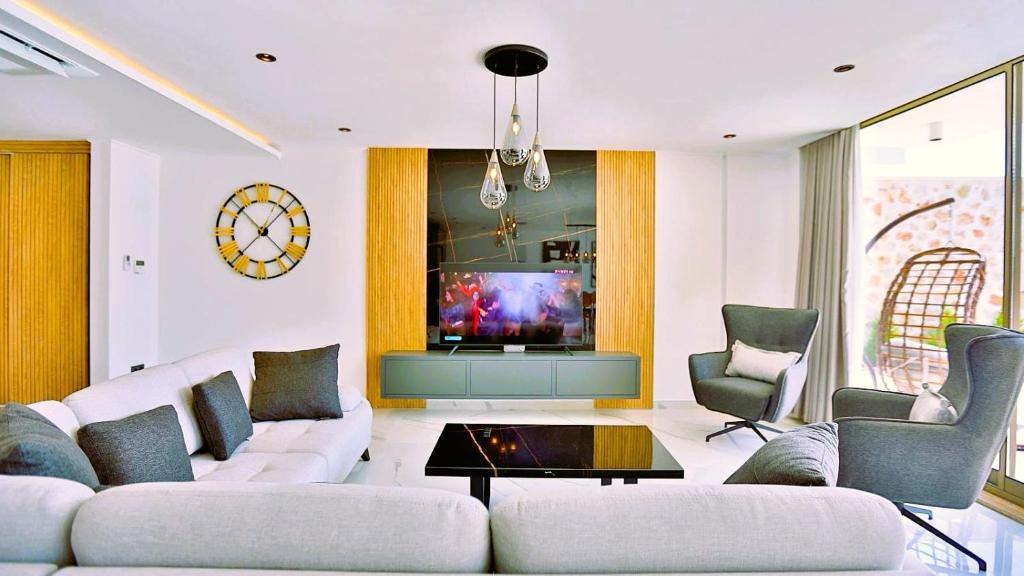 TV a/nebo společenská místnost v ubytování Villa Icon
