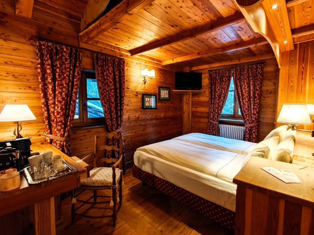 Postel nebo postele na pokoji v ubytování Hotel Breithorn