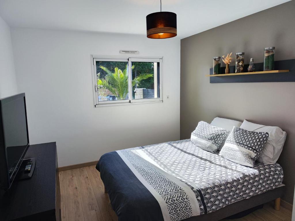 Postel nebo postele na pokoji v ubytování Chambre d'hôtes d'Alex Lebreton