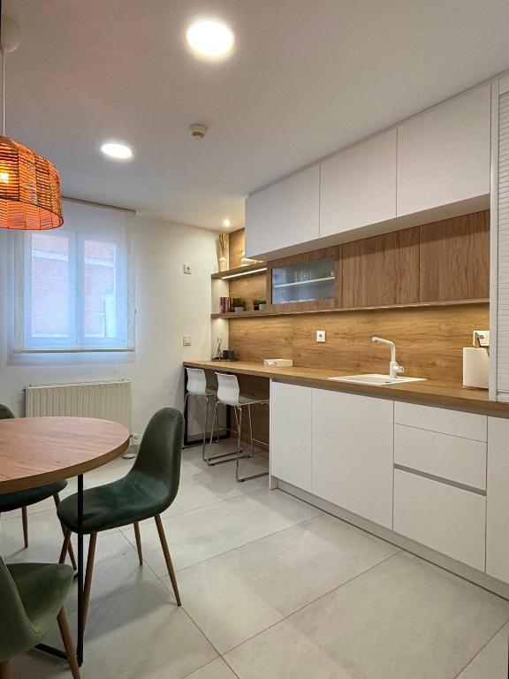 Kuchyň nebo kuchyňský kout v ubytování Hostal Gargal