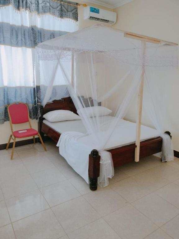 Ένα ή περισσότερα κρεβάτια σε δωμάτιο στο Red House