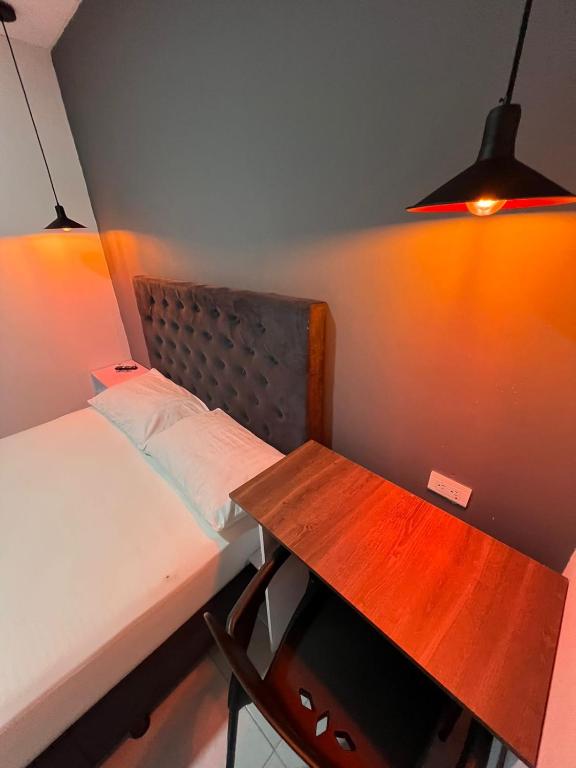 Postel nebo postele na pokoji v ubytování Hotel Almalu