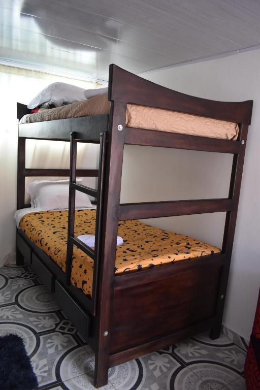 Postel nebo postele na pokoji v ubytování La posada de Martha