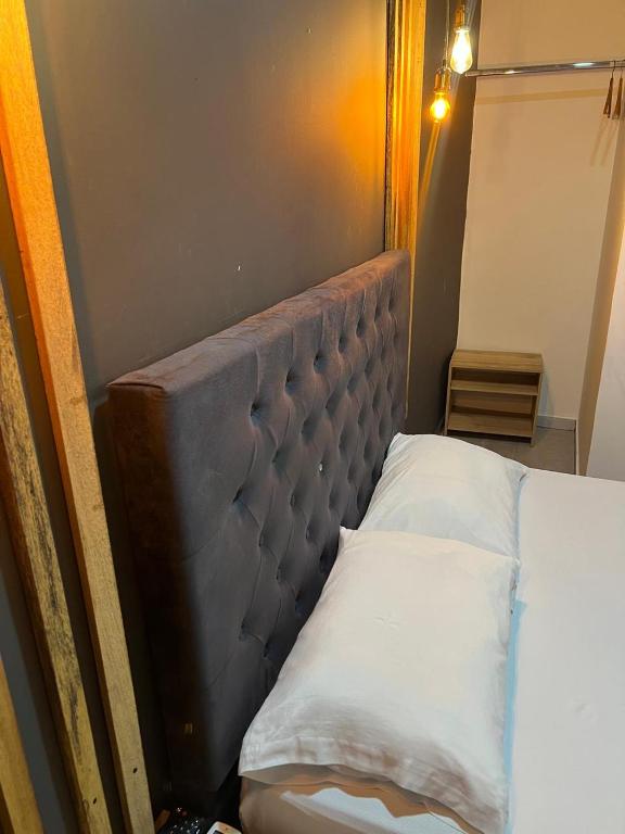 Postel nebo postele na pokoji v ubytování Hotel Almalu