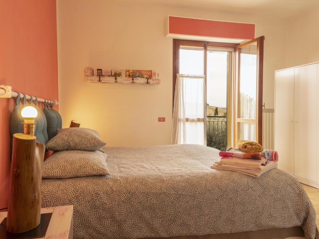 Postel nebo postele na pokoji v ubytování Agriturismo Boschetto