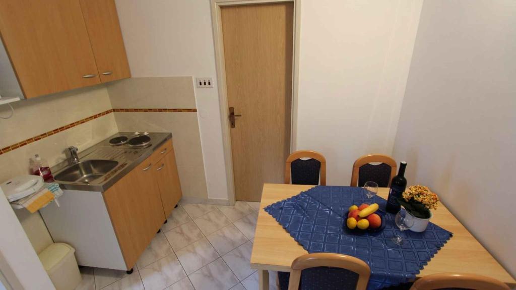 Kuchyň nebo kuchyňský kout v ubytování Apartment Porat 22