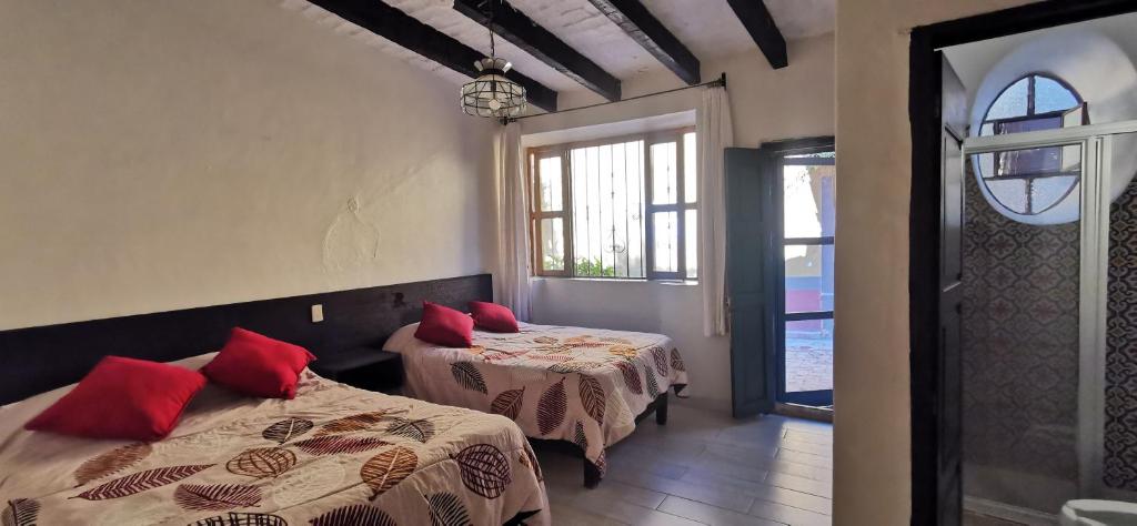 Postel nebo postele na pokoji v ubytování Hotel Sautto