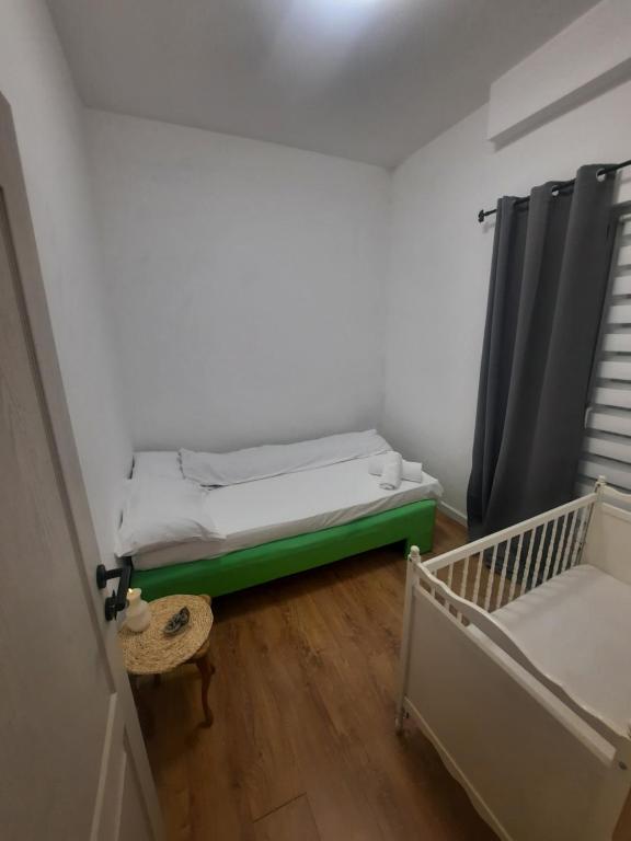 Postel nebo postele na pokoji v ubytování Stan na dan Maksim
