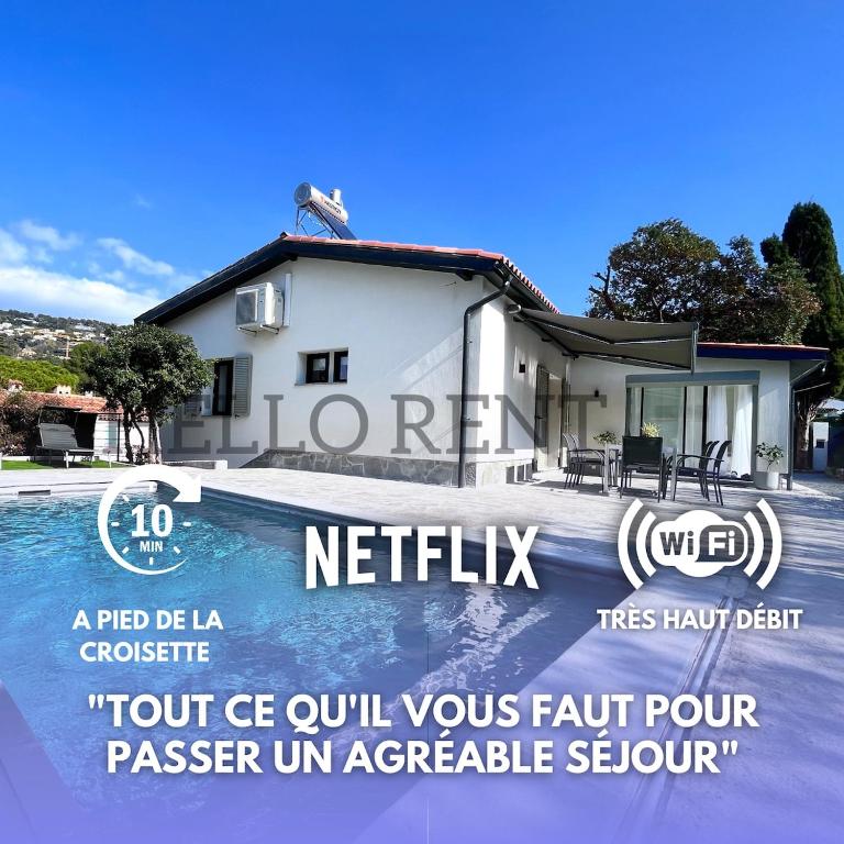 un panneau devant une maison avec piscine dans l'établissement Cannes Centre Grande Villa piscine chauffée, à Cannes