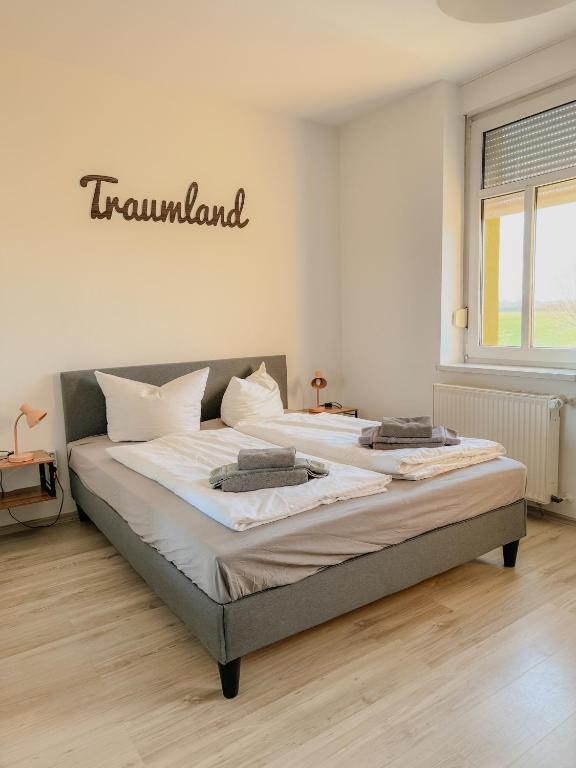 Postel nebo postele na pokoji v ubytování Landgasthof am Bäumchen