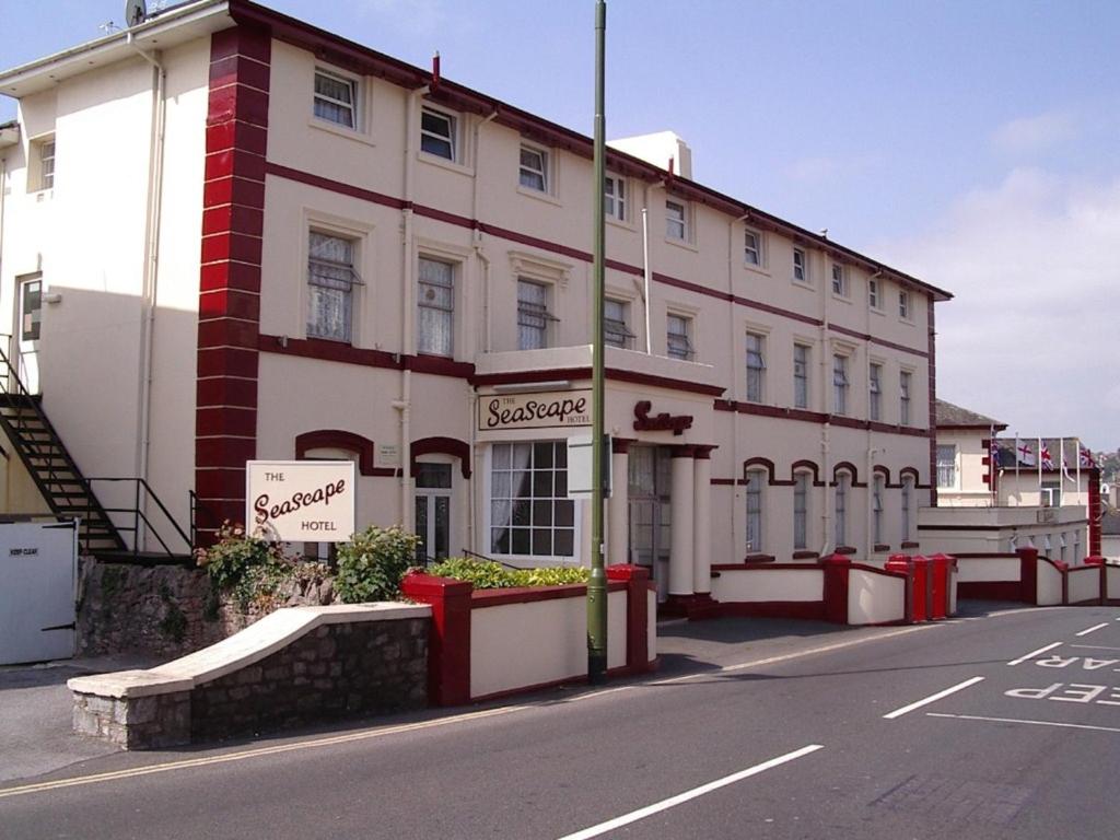 a large building on the side of a street at Seascape Hotel in Torquay