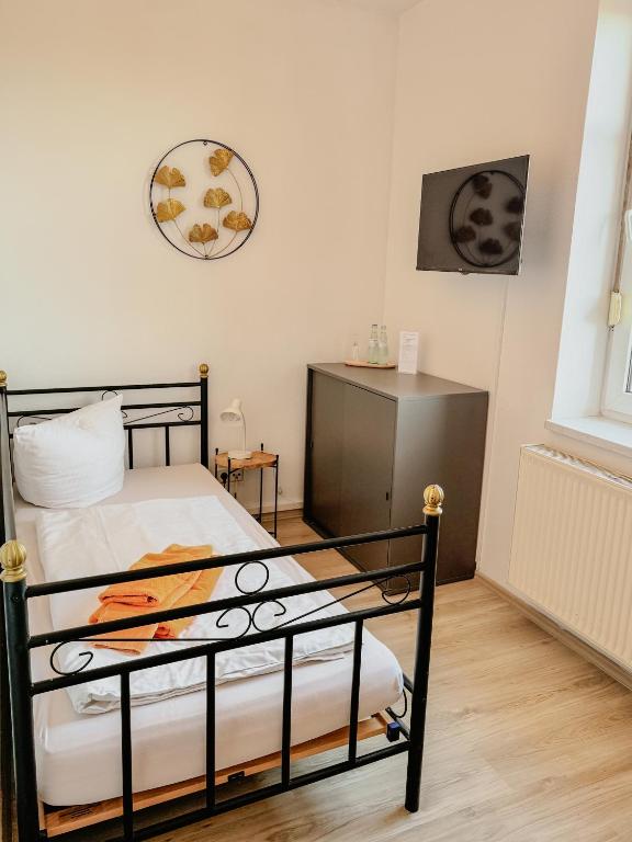 Postel nebo postele na pokoji v ubytování Landgasthof am Bäumchen