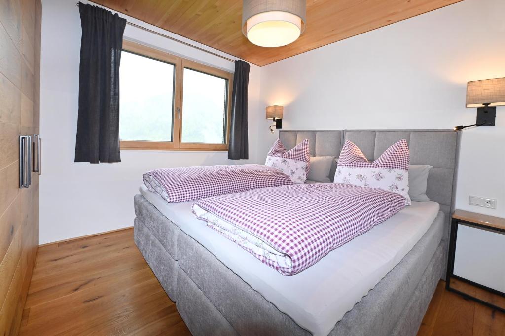 Postel nebo postele na pokoji v ubytování Panoramahof Bergglück