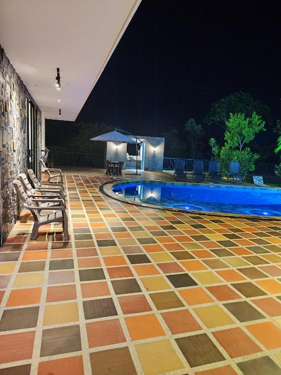 Bazén v ubytování Finca La Casa de Pablo nebo v jeho okolí