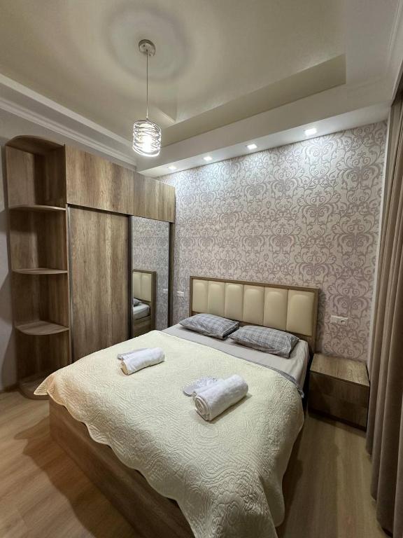 Postel nebo postele na pokoji v ubytování Marika apartment