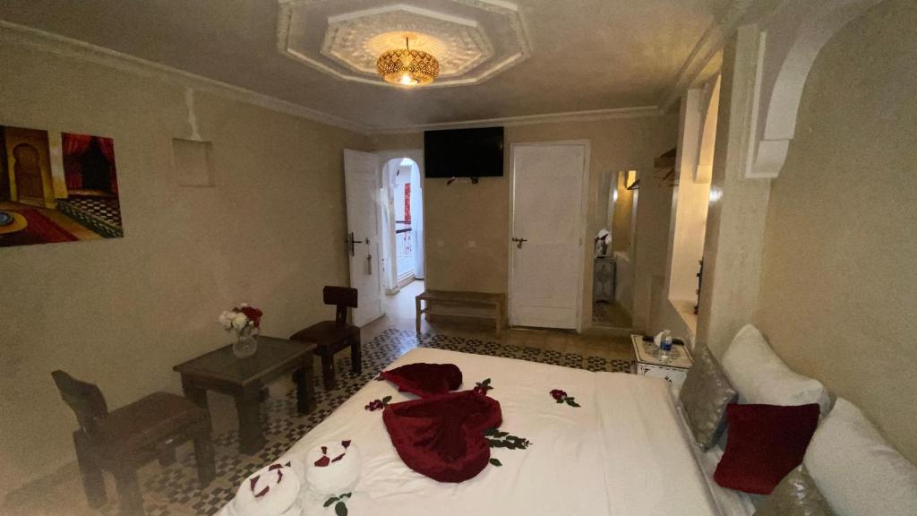 Postel nebo postele na pokoji v ubytování Riad Makech